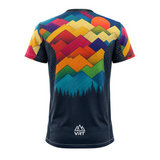 A short-sleeve athletic jersey shown from the back, featuring a colorful mountain and sun graphic in shades of yellow, orange, red, green, blue, and purple over a dark navy base. 